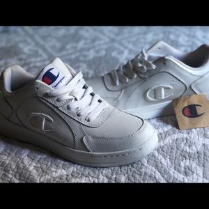 All white champion shoes with tag 9.5